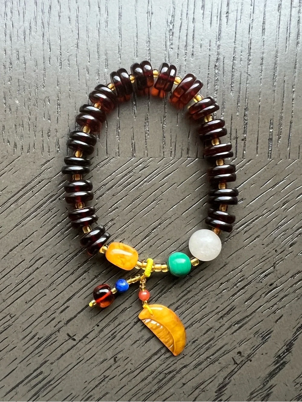 Blood Amber donut bracelet with charm 9mm SIZE 6.5’